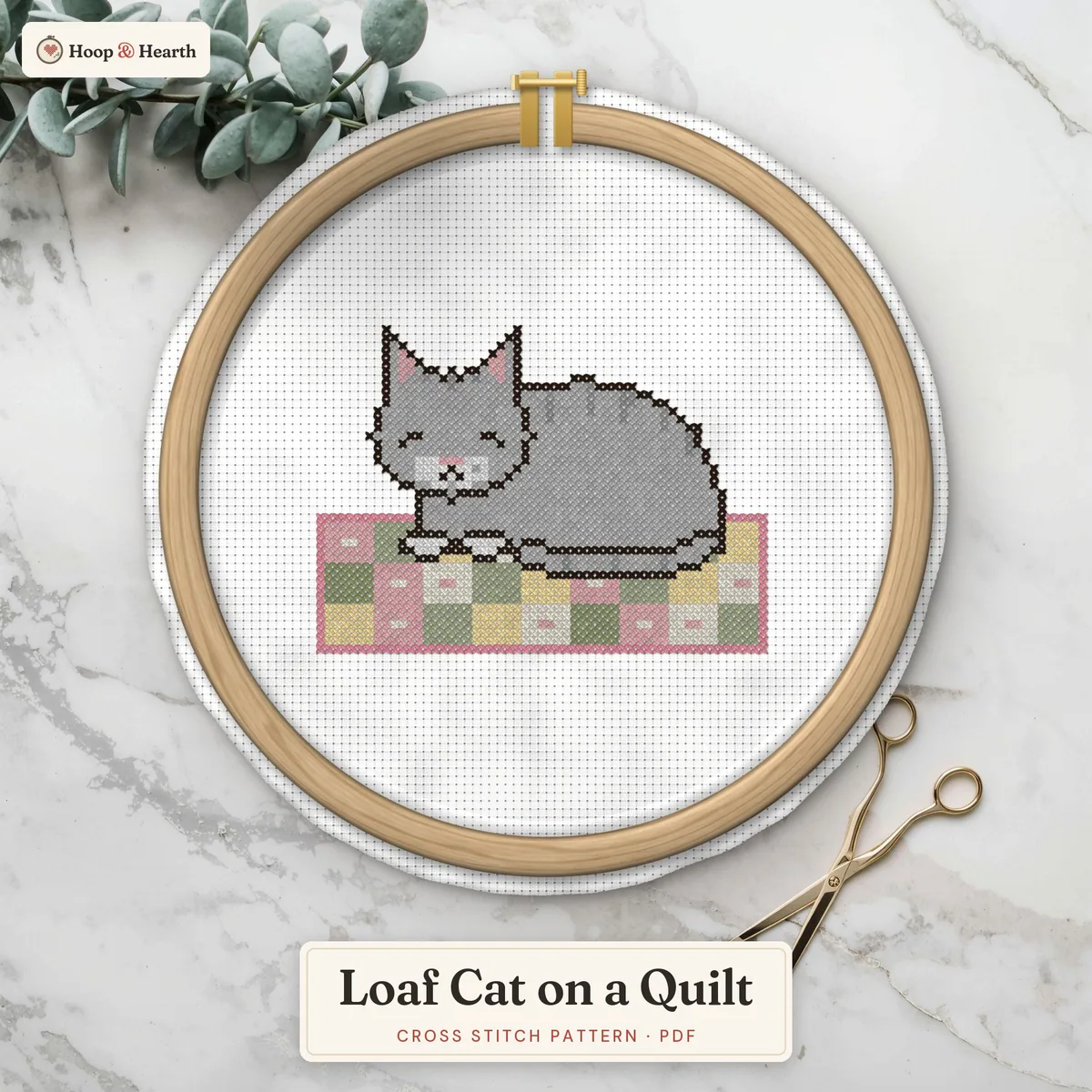 Loaf Cat on a Quilt – cover image